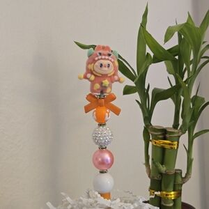 Cute Labubu beaded pen is a customizable "beadabl Bead Pen - Orange, Pink, White